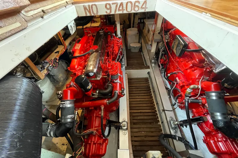 Mercator Yacht Photos Pics Engine room of 1985 Grand Banks 42 Classic with red engines and mechanical components.