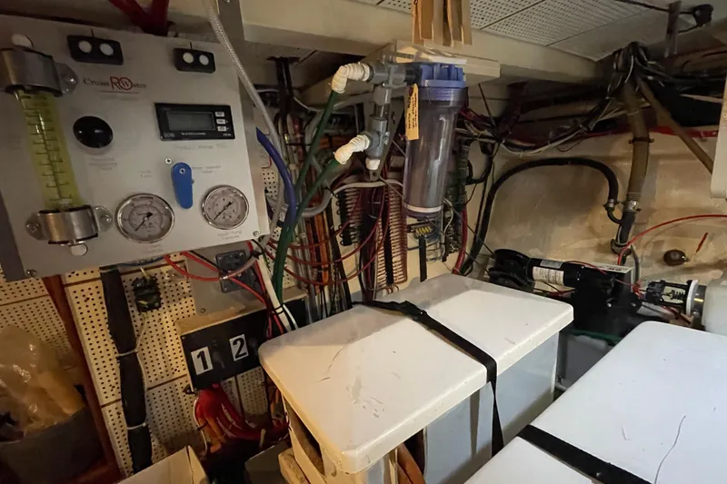 Mercator Yacht Photos Pics Engine room of 1985 Grand Banks 42 Classic with control panel and wiring.