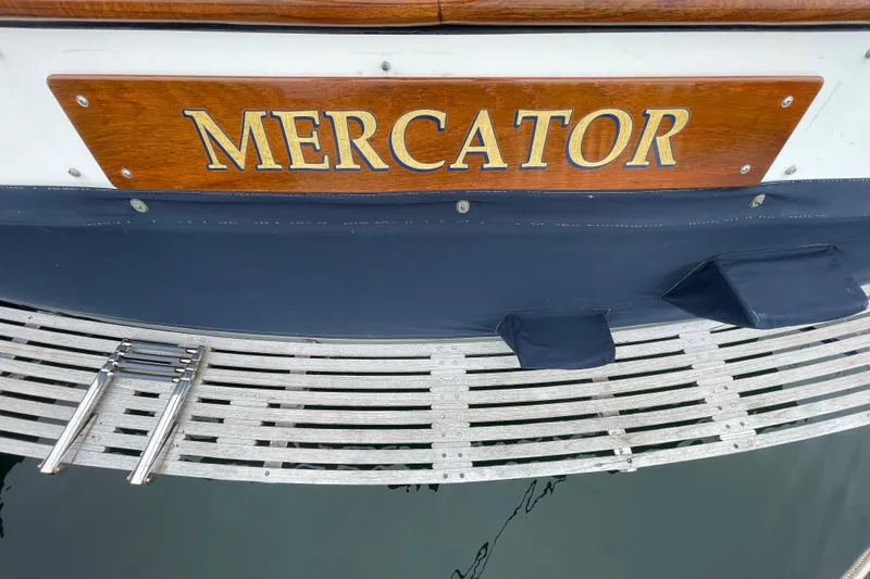 Mercator Yacht Photos Pics Nameplate of 1985 Grand Banks 42 Classic boat, "Mercator," with swim platform.