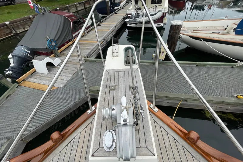 Mercator Yacht Photos Pics Bow view of 1985 Grand Banks 42 Classic yacht docked at marina.