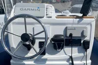 Steering console of 2022 Gemini WR650 boat with Garmin navigation equipment.