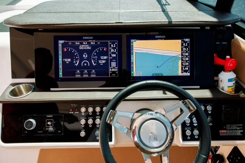 Lady Iryna Yacht Photos Pics Dashboard of 2022 Sea Ray Sundancer 320 Outboard with navigation and control displays.