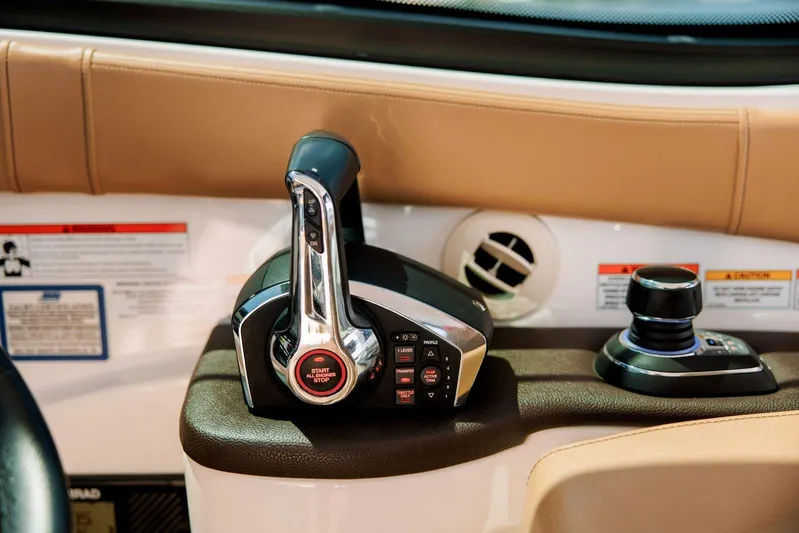 Lady Iryna Yacht Photos Pics 2022 Sea Ray Sundancer 320 Outboard control panel with joystick and throttle.