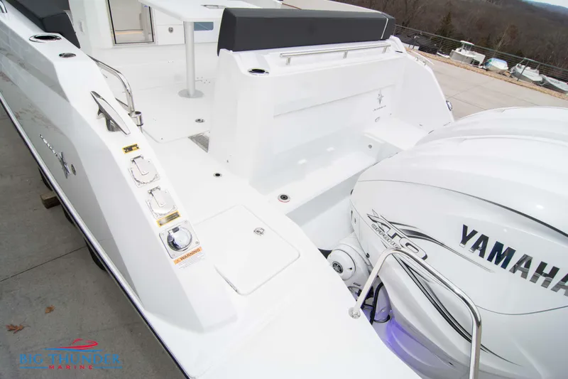  Yacht Photos Pics 2023 Jeanneau Leader 10.5 CC boat with Yamaha engine, rear deck view.