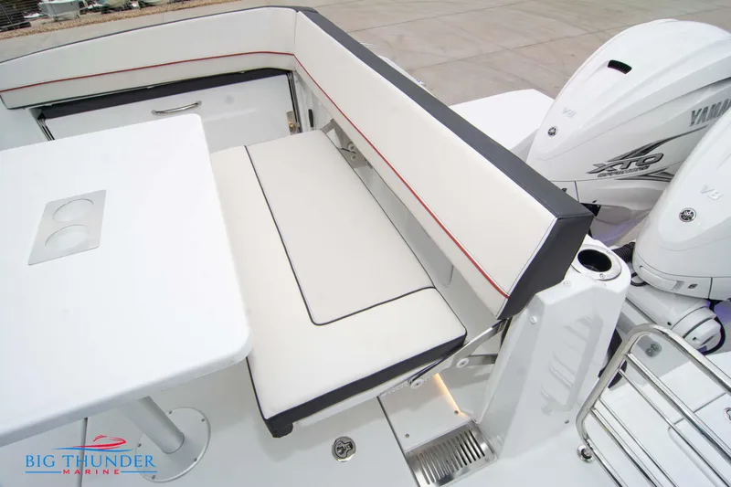  Yacht Photos Pics 2023 Jeanneau Leader 10.5 CC boat interior with seating and Yamaha engines.