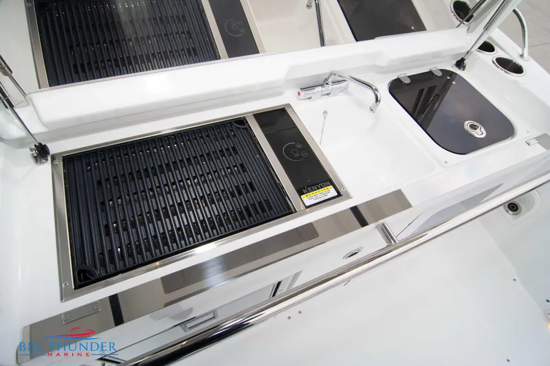  Yacht Photos Pics 2023 Jeanneau Leader 10.5 CC boat kitchen with grill and sink.