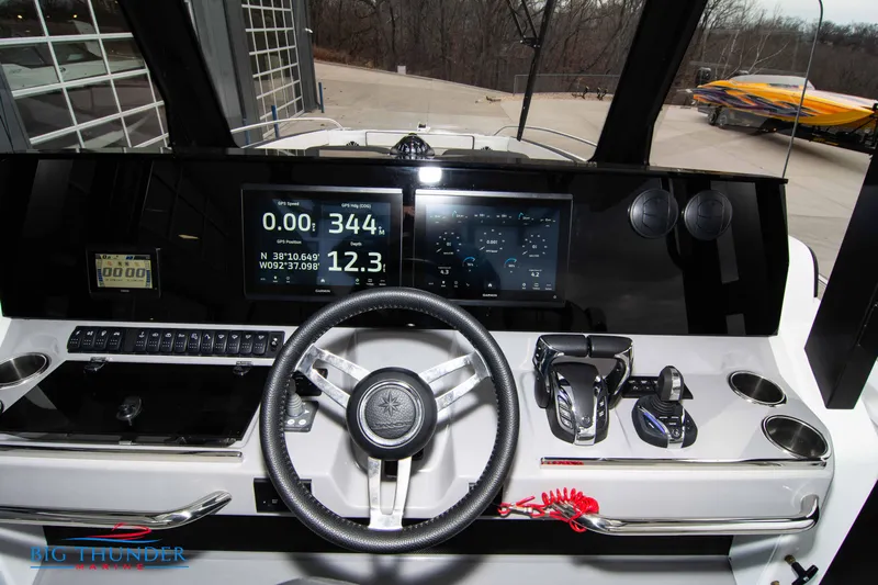  Yacht Photos Pics 2023 Jeanneau Leader 10.5 CC helm with modern controls and digital displays.