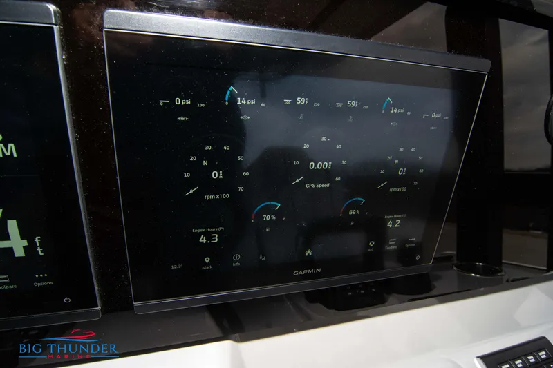  Yacht Photos Pics Garmin display on 2023 Jeanneau Leader 10.5 CC boat dashboard.