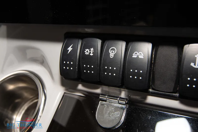  Yacht Photos Pics Control panel switches on 2023 Jeanneau Leader 10.5 CC boat.