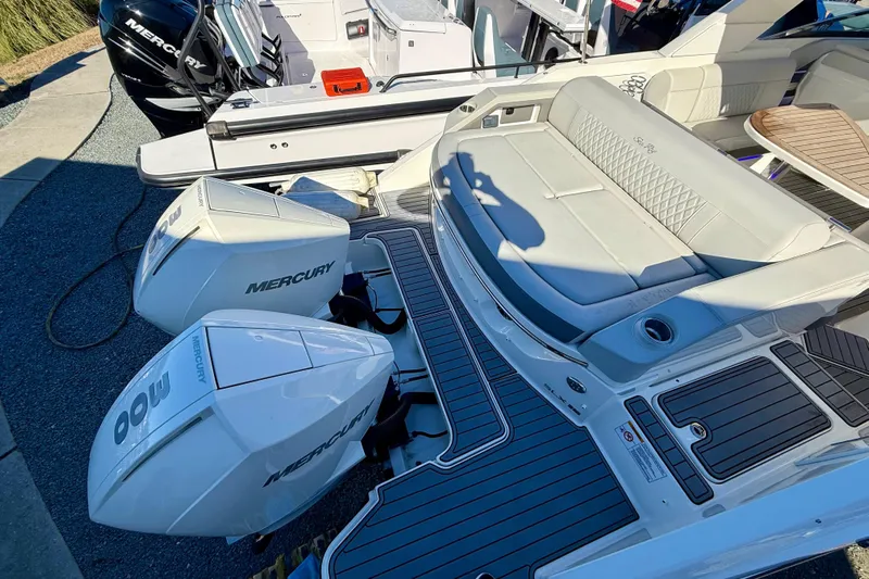  Yacht Photos Pics 2021 Sea Ray SLX 310 Outboard with dual Mercury engines and luxurious seating.