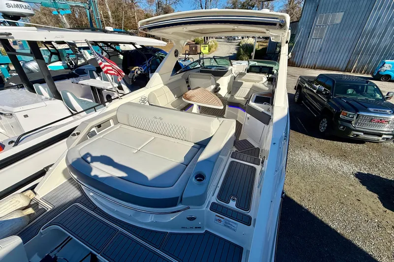  Yacht Photos Pics 2021 Sea Ray SLX 310 Outboard boat with spacious seating and modern design.