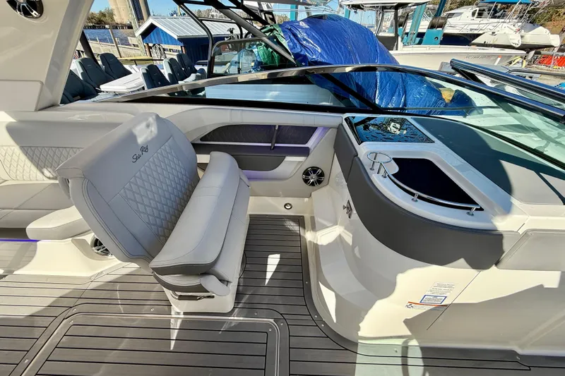  Yacht Photos Pics 2021 Sea Ray SLX 310 Outboard interior with luxurious seating and sleek design.