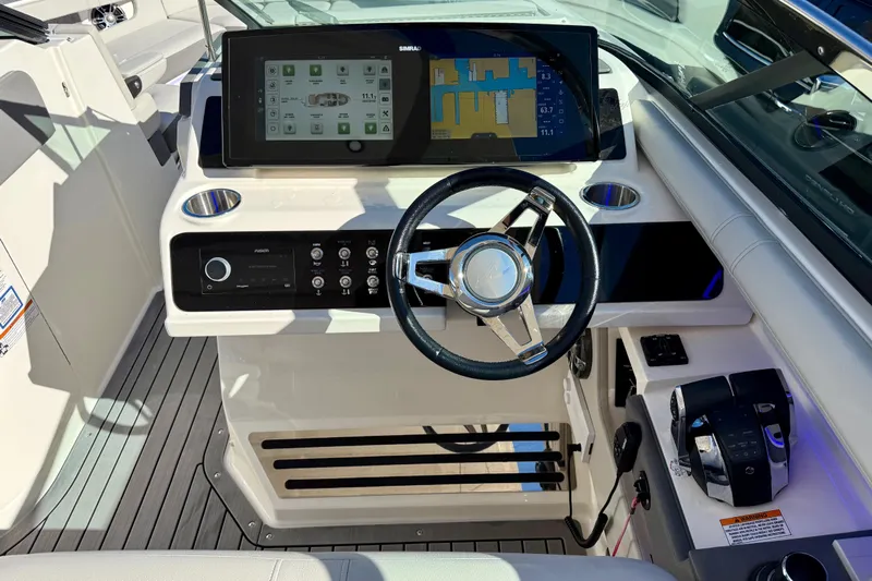  Yacht Photos Pics 2021 Sea Ray SLX 310 Outboard helm with advanced navigation display and controls.