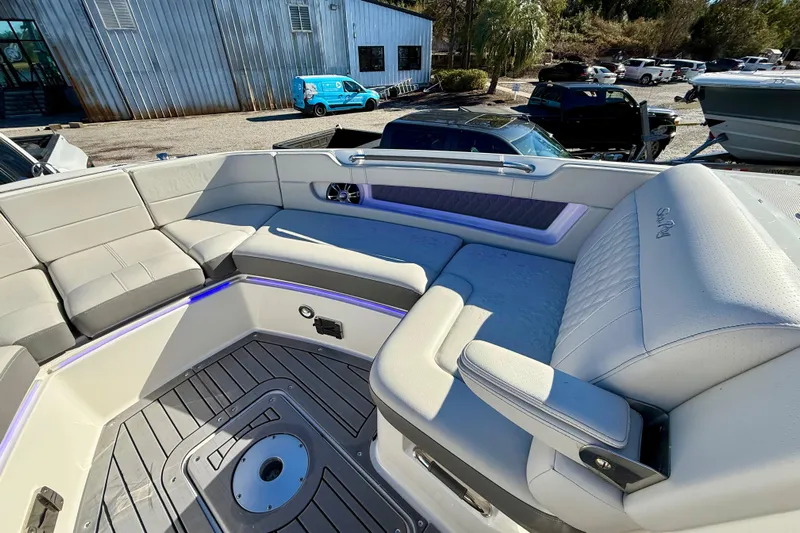  Yacht Photos Pics Luxurious seating on 2021 Sea Ray SLX 310 Outboard boat, featuring modern design and comfort.