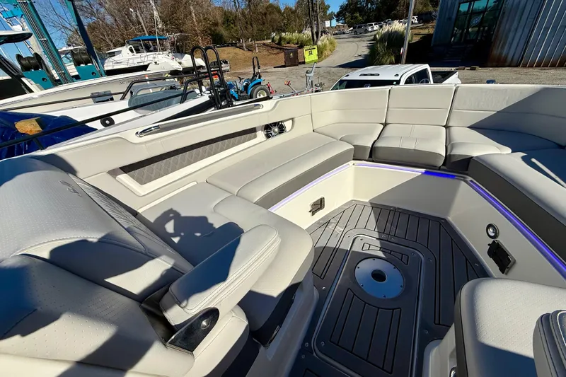  Yacht Photos Pics 2021 Sea Ray SLX 310 Outboard boat interior with luxurious seating and modern design.