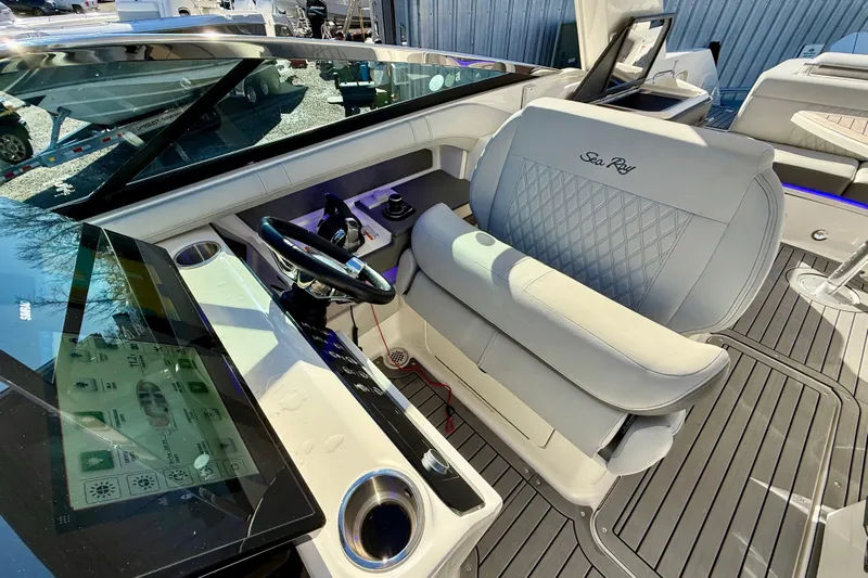  Yacht Photos Pics 2021 Sea Ray SLX 310 Outboard cockpit with modern controls and luxurious seating.