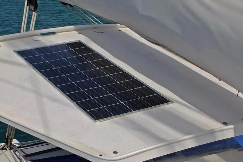 Delphine Yacht Photos Pics Solar panel on 2003 Outremer 45 yacht deck, harnessing renewable energy.