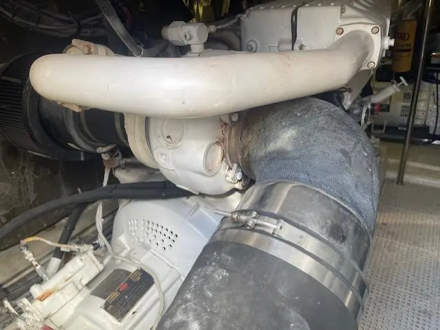 All Hans In Yacht Photos Pics Engine components of a 1999 Riviera SF boat, featuring pipes and hoses.