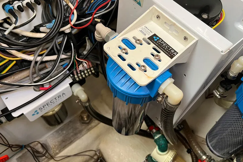 Saba Yacht Photos Pics Engine room of 2013 Jeanneau 57 yacht with Spectra watermaker system.