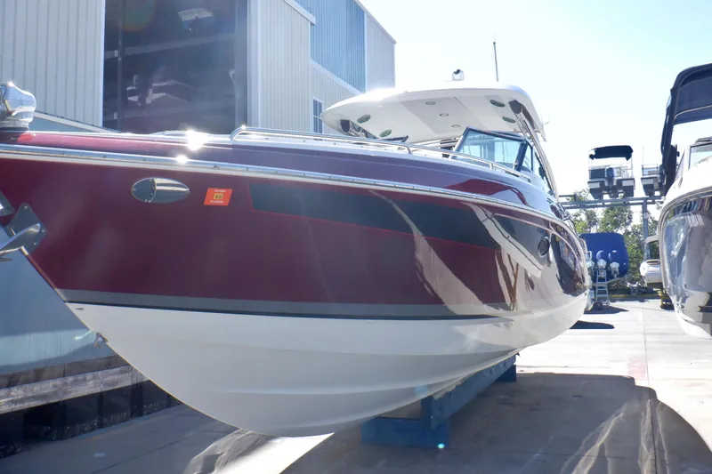 Ship Faced Yacht Photos Pics 2015 Formula 350 Crossover Bowrider in marina, side view, sunny day.