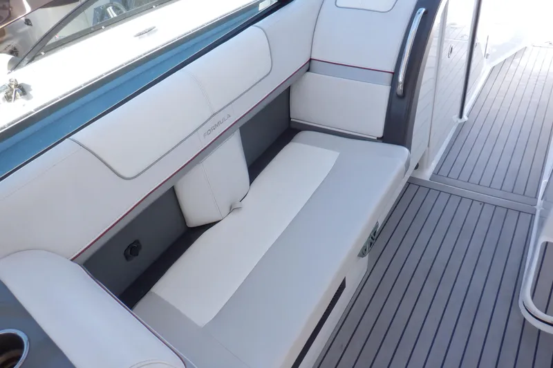 Ship Faced Yacht Photos Pics 2015 Formula 350 Crossover Bowrider interior seating with sleek white upholstery.