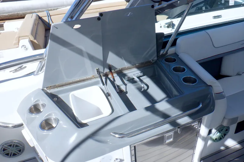 Ship Faced Yacht Photos Pics 2015 Formula 350 Crossover Bowrider boat sink and cup holders on deck.