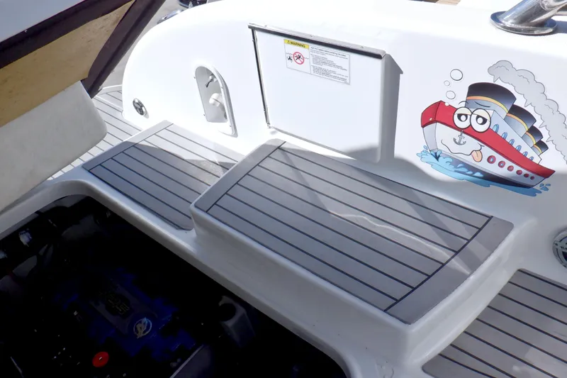 Ship Faced Yacht Photos Pics 2015 Formula 350 Crossover Bowrider boat deck with cartoon ship graphic.