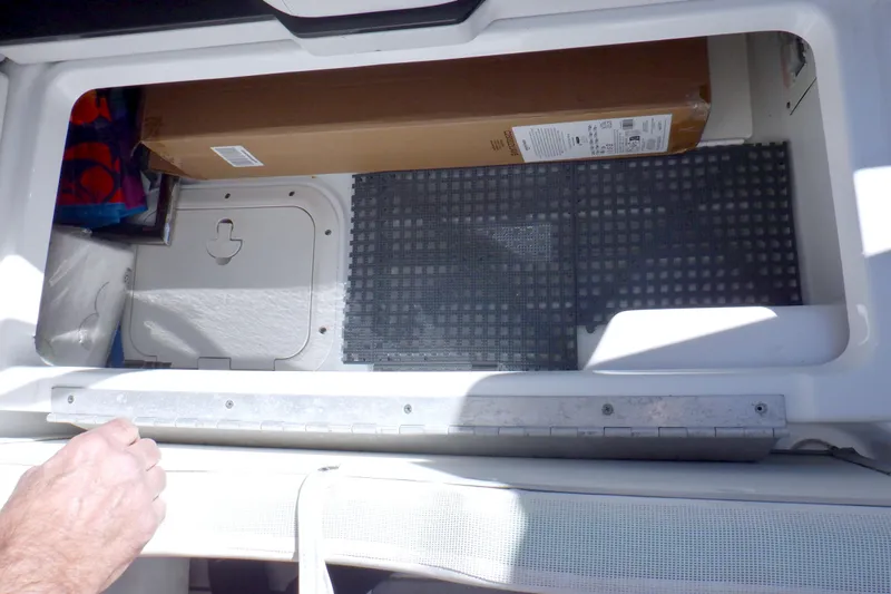 Ship Faced Yacht Photos Pics Storage compartment in 2015 Formula 350 Crossover Bowrider boat, featuring organized space.