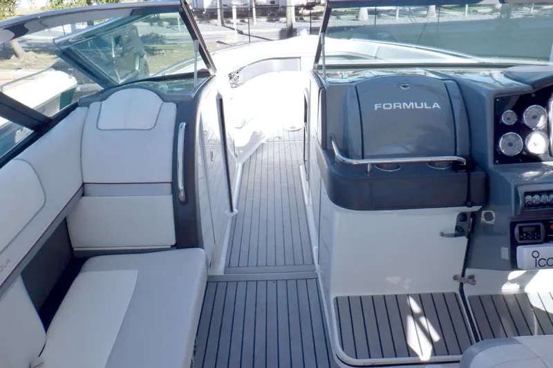 Ship Faced Yacht Photos Pics 2015 Formula 350 Crossover Bowrider interior with sleek seating and modern dashboard.