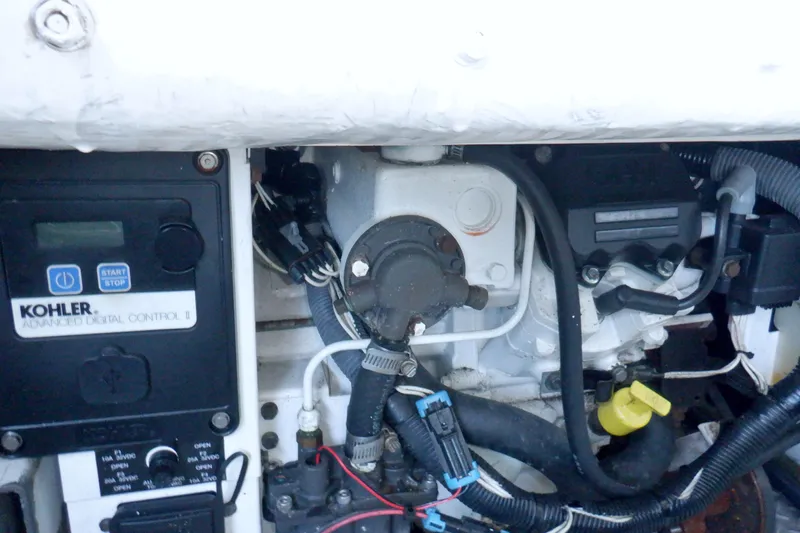Ship Faced Yacht Photos Pics Engine compartment of a 2015 Formula 350 Crossover Bowrider with Kohler control panel.