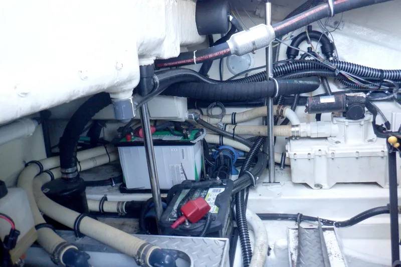 Ship Faced Yacht Photos Pics Engine compartment of a 2015 Formula 350 Crossover Bowrider with visible wiring and components.