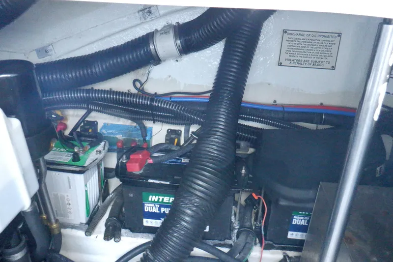 Ship Faced Yacht Photos Pics Engine compartment of a 2015 Formula 350 Crossover Bowrider with batteries and wiring.