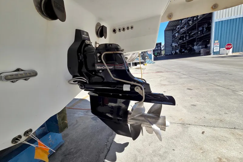 Ship Faced Yacht Photos Pics 2015 Formula 350 Crossover Bowrider with MerCruiser outdrive in a marina setting.