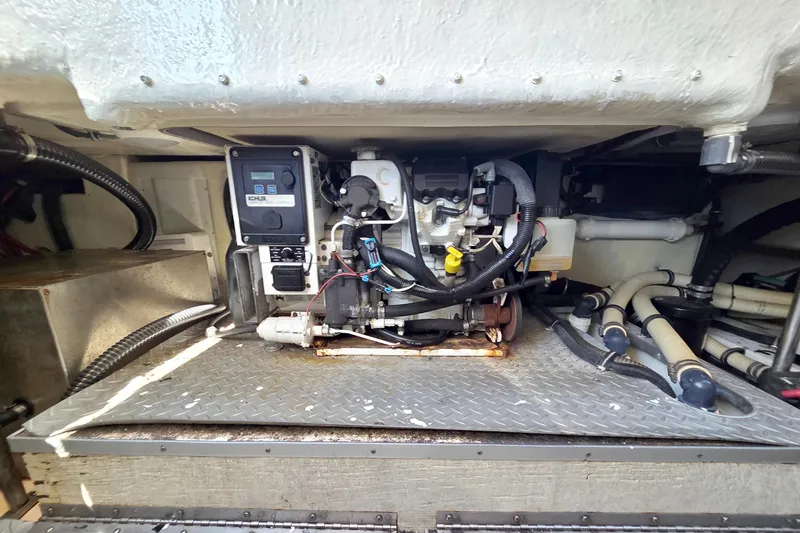 Ship Faced Yacht Photos Pics Engine compartment of a 2015 Formula 350 Crossover Bowrider with visible machinery and wiring.