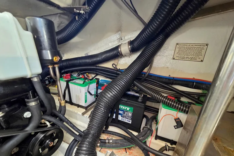 Ship Faced Yacht Photos Pics Engine compartment of 2015 Formula 350 Crossover Bowrider with batteries and wiring.