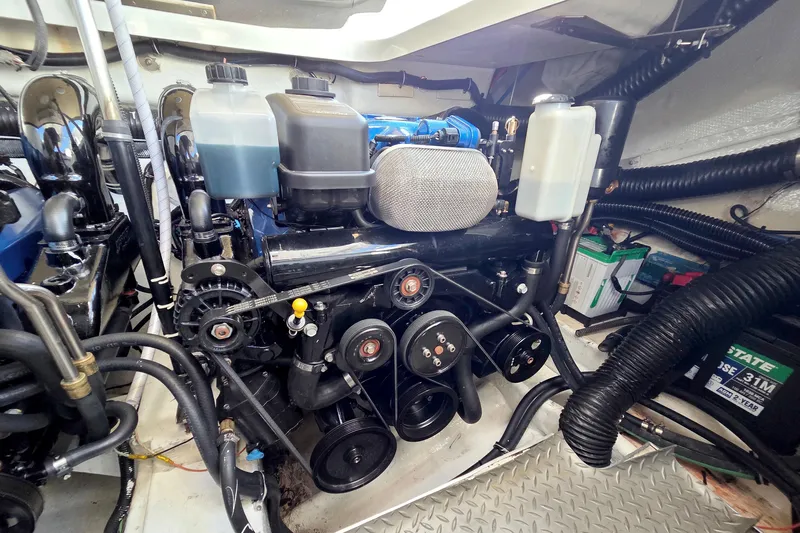 Ship Faced Yacht Photos Pics Engine compartment of a 2015 Formula 350 Crossover Bowrider, showcasing mechanical components.