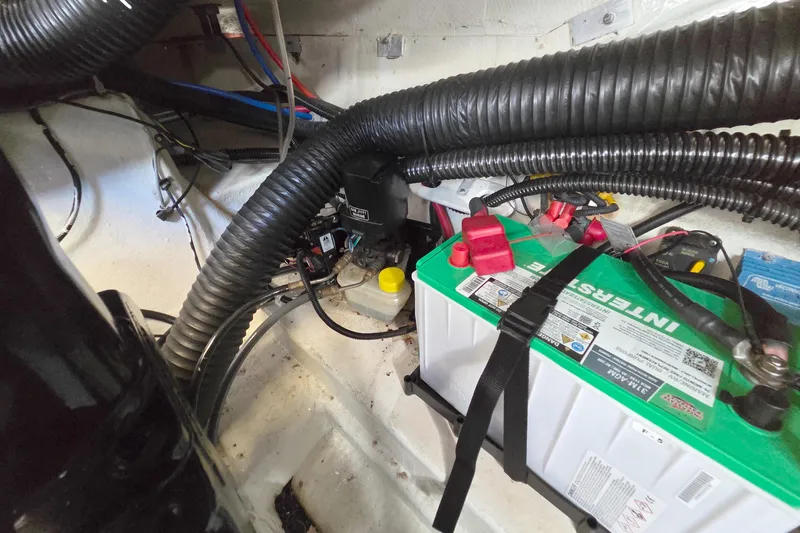 Ship Faced Yacht Photos Pics Engine compartment of a 2015 Formula 350 Crossover Bowrider with battery and wiring.