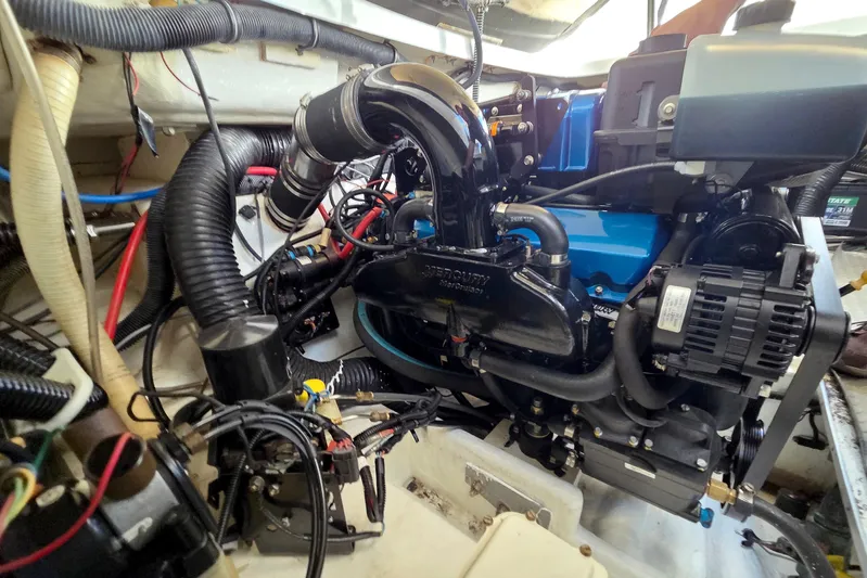 Ship Faced Yacht Photos Pics Engine compartment of a 2015 Formula 350 Crossover Bowrider, showcasing detailed components.