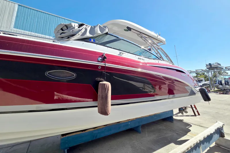 Ship Faced Yacht Photos Pics 2015 Formula 350 Crossover Bowrider in dry dock, red and black exterior.