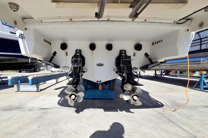 Ship Faced Yacht Photos Pics 2015 Formula 350 Crossover Bowrider boat with dual propellers in dry dock.