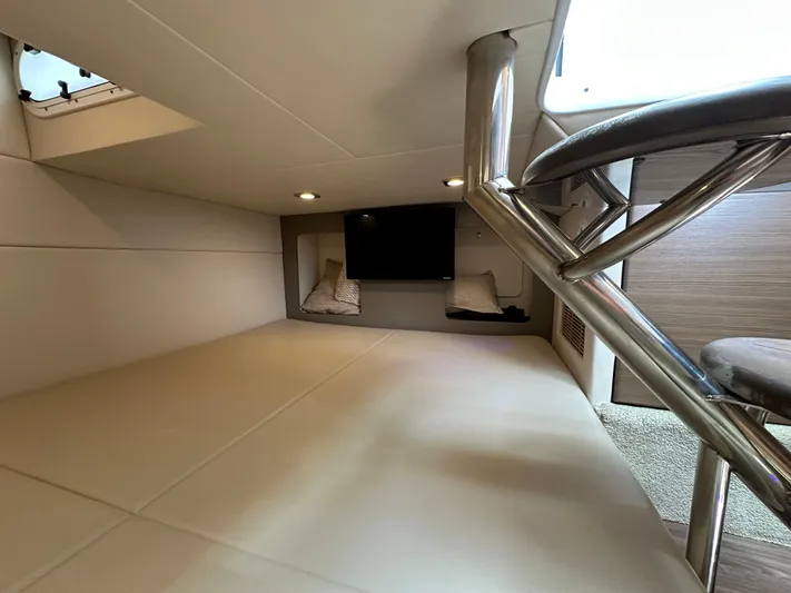  Yacht Photos Pics 2019 Formula 350 Crossover Bowrider cabin interior with TV and seating.