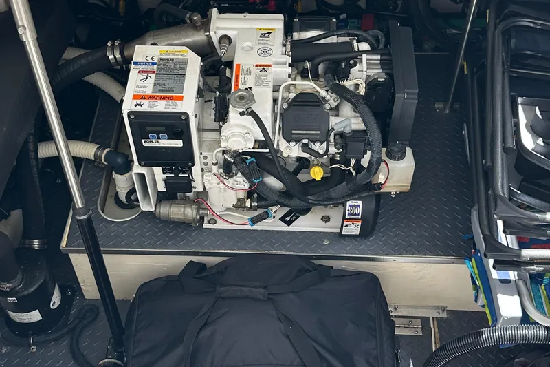  Yacht Photos Pics Engine compartment of a 2019 Formula 350 Crossover Bowrider, showcasing mechanical components.