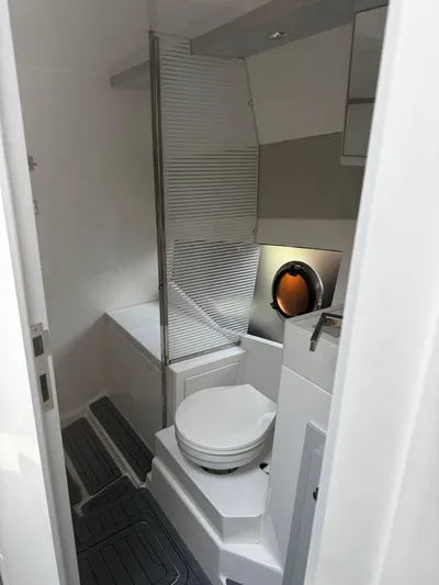 Seas The Moment Yacht Photos Pics Modern bathroom in 2021 Evolve 400HT yacht with sleek design and compact layout.