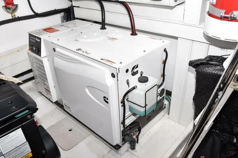  Yacht Photos Pics Cummins Onan generator in a 2022 Princess V50 yacht engine room.