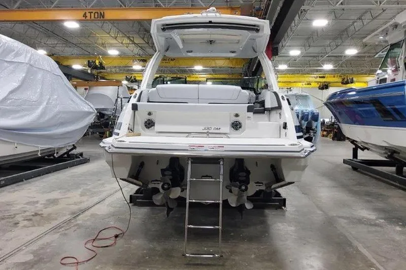 330cbr Yacht Photos Pics 2025 Formula 330 Crossover Bowrider I/O in a boatyard.