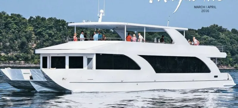  Yacht Photos Pics 2015 Stardust Cruisers 20' x 106' yacht cruising on a lake with passengers.