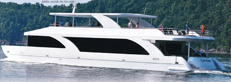  Yacht Photos Pics 2015 Stardust Cruisers 20' x 106' houseboat cruising on a lake with passengers.