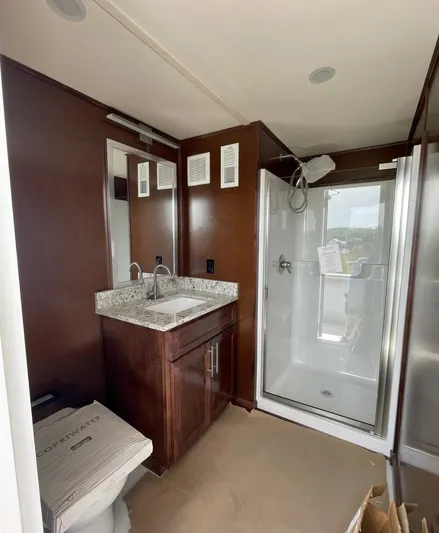  Yacht Photos Pics Modern bathroom in a 2015 Stardust Cruisers 20' x 106' houseboat.