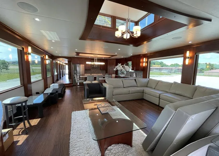  Yacht Photos Pics Luxurious interior of 2015 Stardust Cruisers 20' x 106' houseboat with modern furnishings.