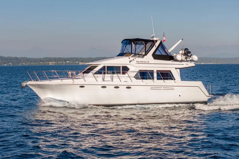 Restless II Yacht Photos Pics 2007 Navigator Classic 48 yacht cruising on open water.